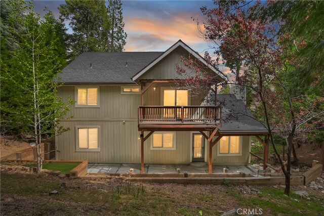 28589 Shenandoah Dr, Lake Arrowhead, CA 92352 - rear view of property with a balcony, a patio, and a shingled roof