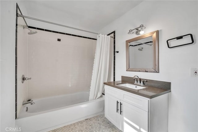 932 S Cloverdale Ave, Los Angeles, CA 90036 - bathroom with shower / bath combo with shower curtain, vanity, and tile patterned flooring