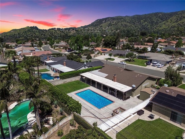 1298 Oak Ridge Dr, La Verne, CA 91750 - aerial view at dusk of view of pool area, a mountain view, and a residential view