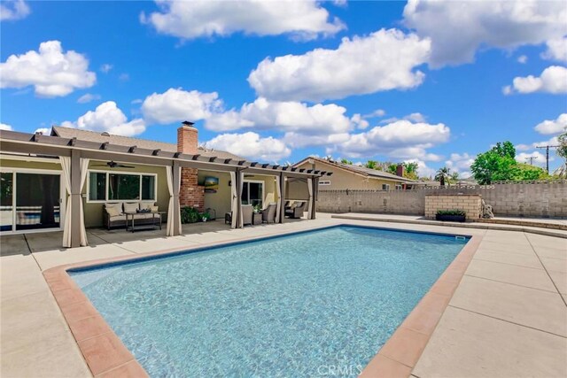 1298 Oak Ridge Dr, La Verne, CA 91750 - view of swimming pool featuring ceiling fan, fence, a patio, and an outdoor hangout area