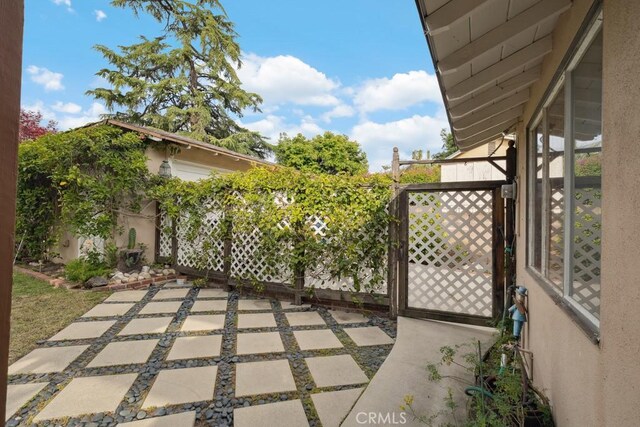 7861 Cora St, Sunland, CA 91040 - view of patio with fence and a gate