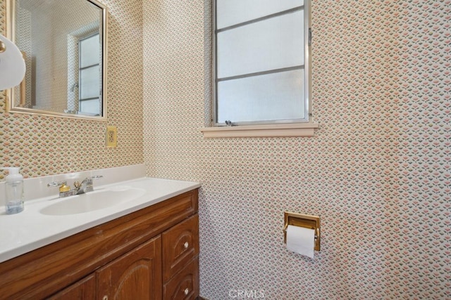 7861 Cora St, Sunland, CA 91040 - bathroom with wallpapered walls and vanity