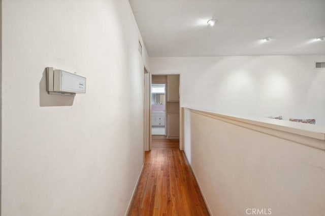 7861 Cora St, Sunland, CA 91040 - hallway with wood finished floors and baseboards