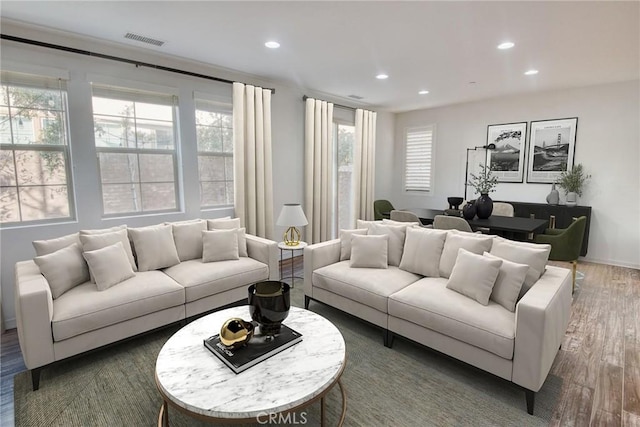 89 Baculo St, Rancho Mission Viejo, CA 92694 - living room featuring recessed lighting, wood finished floors, and healthy amount of natural light