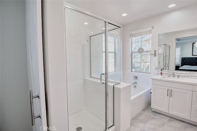 89 Baculo St, Rancho Mission Viejo, CA 92694 - bathroom with a garden tub, a stall shower, vanity, connected bathroom, and tile patterned flooring