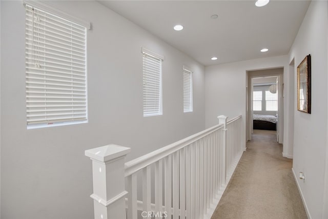 89 Baculo St, Rancho Mission Viejo, CA 92694 - hall with light colored carpet, recessed lighting, and an upstairs landing
