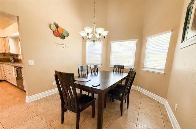 26490 Mapleridge Way, Moreno Valley, CA 92555 - dining space with light tile patterned floors, a chandelier, baseboards, and a high ceiling