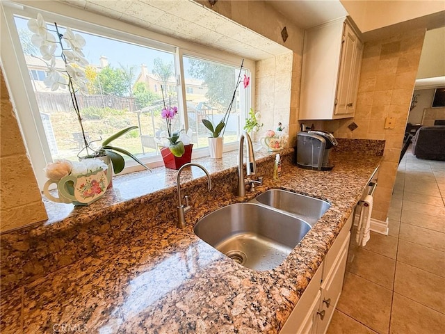 26490 Mapleridge Way, Moreno Valley, CA 92555 - kitchen with a sink, stone counters, and tile patterned floors