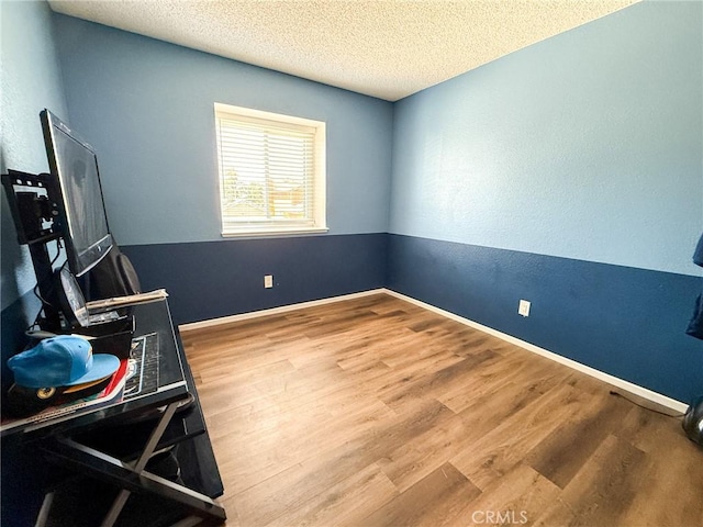 26490 Mapleridge Way, Moreno Valley, CA 92555 - interior space featuring wood finished floors and a textured ceiling
