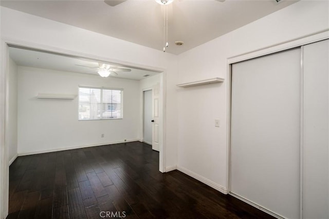 27917 Busman Rd, Murrieta, CA 92563 - unfurnished bedroom featuring dark wood-type flooring, a closet, and a ceiling fan