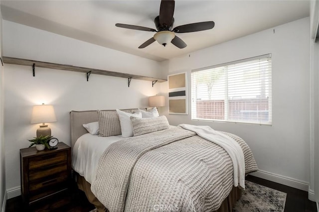 27917 Busman Rd, Murrieta, CA 92563 - bedroom featuring baseboards, dark wood finished floors, and ceiling fan