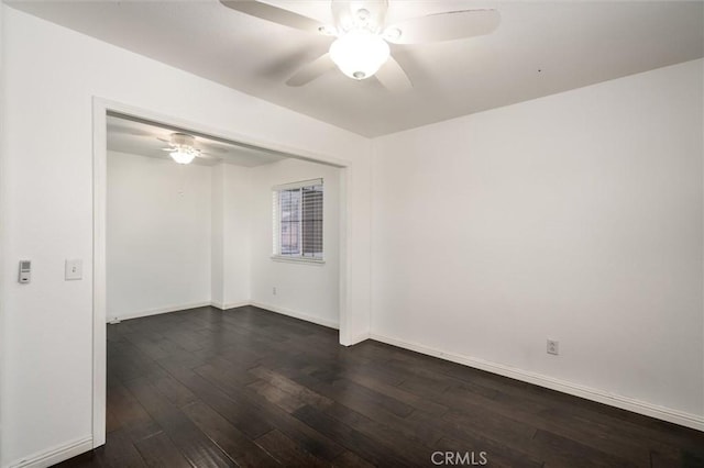 27917 Busman Rd, Murrieta, CA 92563 - empty room with a ceiling fan and dark wood-type flooring