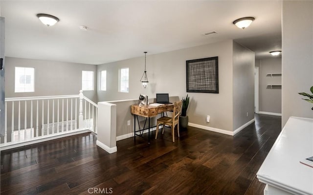 27917 Busman Rd, Murrieta, CA 92563 - dining space featuring healthy amount of natural light, wood-type flooring, and baseboards