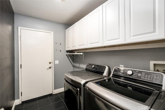 27917 Busman Rd, Murrieta, CA 92563 - laundry area with cabinet space, separate washer and dryer, and dark tile patterned flooring