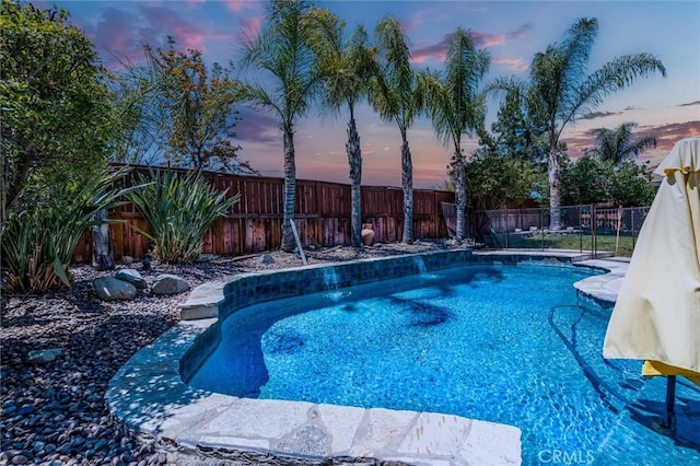 27917 Busman Rd, Murrieta, CA 92563 - pool at dusk featuring a fenced backyard