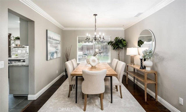 27917 Busman Rd, Murrieta, CA 92563 - dining space with a chandelier, dark wood-style floors, and ornamental molding