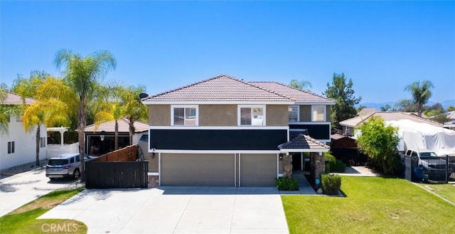 27917 Busman Rd, Murrieta, CA 92563 - view of front facade with an attached garage, stucco siding, concrete driveway, stone siding, and a tile roof