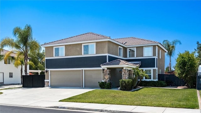 27917 Busman Rd, Murrieta, CA 92563 - view of front facade featuring an attached garage, a tile roof, stone siding, and stucco siding