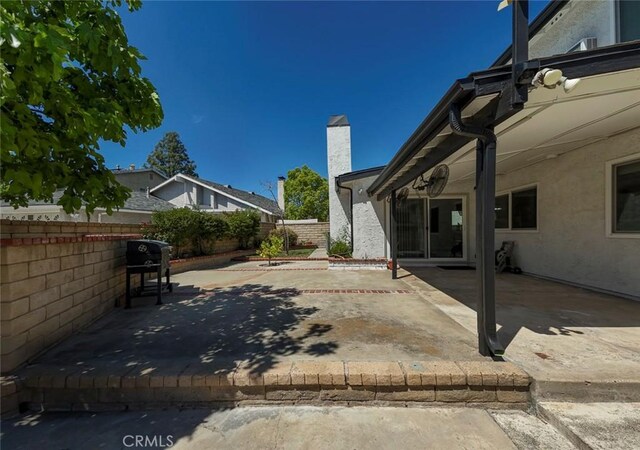 27533 Caraway Ln, Saugus, CA 91350 - fenced backyard featuring a patio and grilling area