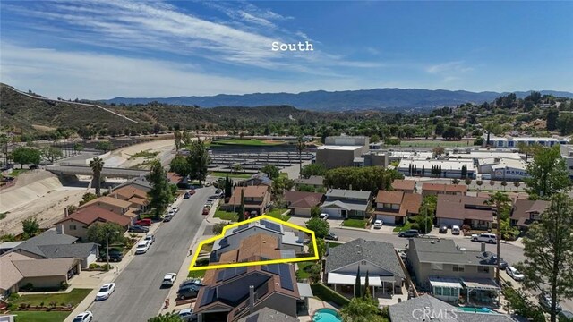 27533 Caraway Ln, Saugus, CA 91350 - aerial view of residential area featuring mountains and property boundaries highlighted