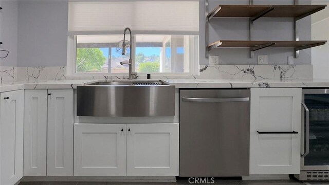 27533 Caraway Ln, Saugus, CA 91350 - kitchen featuring dishwasher, open shelves, beverage cooler, and white cabinets