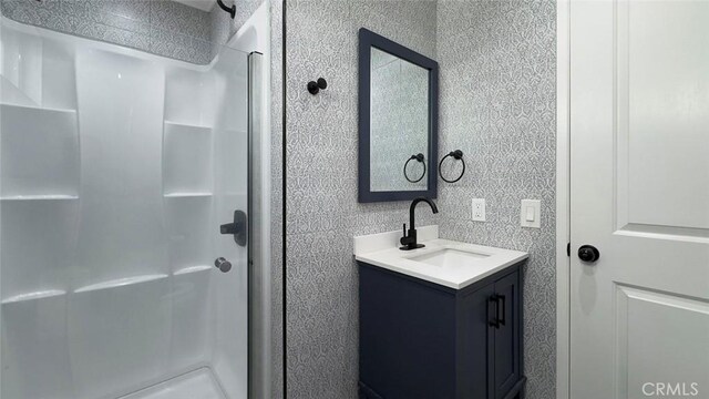 27533 Caraway Ln, Saugus, CA 91350 - bathroom featuring vanity and a shower stall