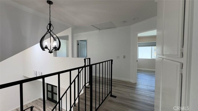 27533 Caraway Ln, Saugus, CA 91350 - corridor featuring an upstairs landing, ornamental molding, and wood finished floors