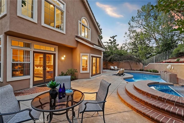 26752 Devonshire Rd, Laguna Hills, CA 92653 - view of pool featuring an in-ground hot tub, a patio area, french doors, and a fenced backyard