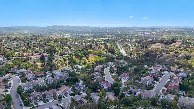 26752 Devonshire Rd, Laguna Hills, CA 92653 - aerial view of property and surrounding area with a mountainous background and nearby suburban area