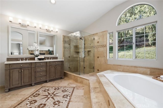 26752 Devonshire Rd, Laguna Hills, CA 92653 - bathroom with plenty of natural light, a shower stall, vaulted ceiling, a garden tub, and double vanity