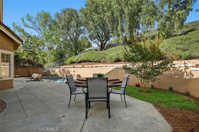 26752 Devonshire Rd, Laguna Hills, CA 92653 - view of patio featuring a fenced backyard and outdoor dining space