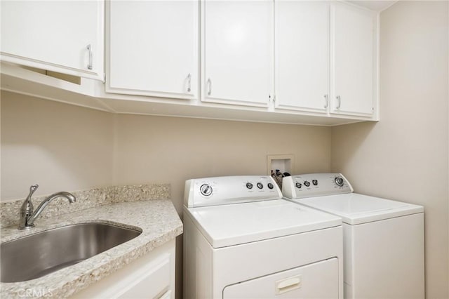 26752 Devonshire Rd, Laguna Hills, CA 92653 - clothes washing area with independent washer and dryer and cabinet space