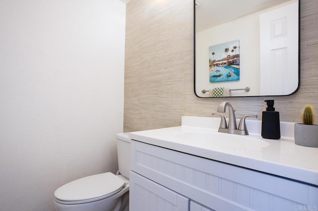 2506 Woodlands Way, Oceanside, CA 92054 - half bath featuring toilet, vanity, and tasteful backsplash