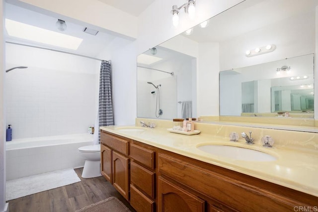 2506 Woodlands Way, Oceanside, CA 92054 - bathroom with toilet, wood finished floors, shower / bath combo, and double vanity
