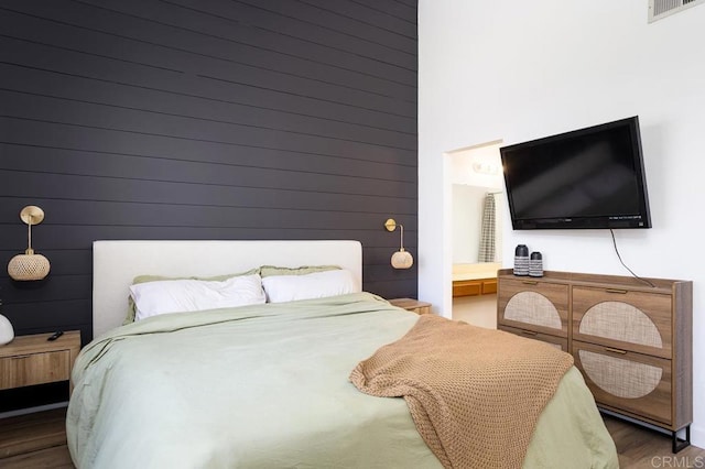 2506 Woodlands Way, Oceanside, CA 92054 - bedroom featuring wood finished floors, ensuite bath, and wood walls