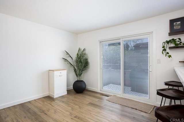 2506 Woodlands Way, Oceanside, CA 92054 - empty room with light wood-style flooring and baseboards