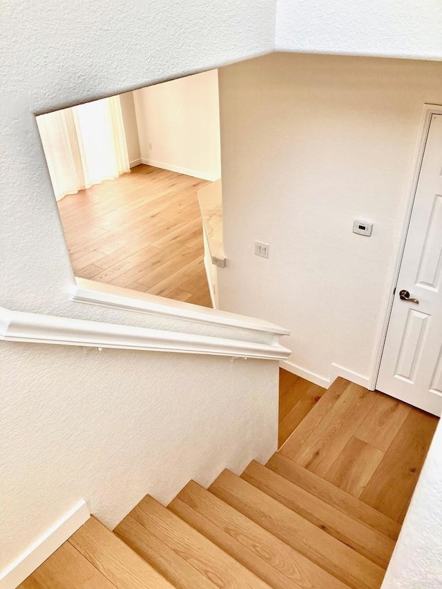 6180 Citracado Cir, Carlsbad, CA 92009 - stairs with wood finished floors and lofted ceiling