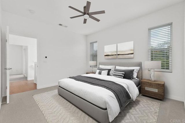 6180 Citracado Cir, Carlsbad, CA 92009 - bedroom with carpet floors and a ceiling fan