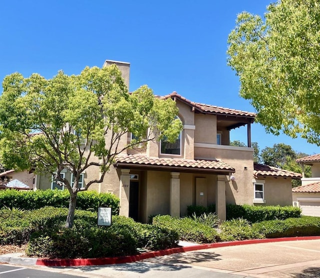 6180 Citracado Cir, Carlsbad, CA 92009 - mediterranean / spanish house featuring stucco siding and a tiled roof