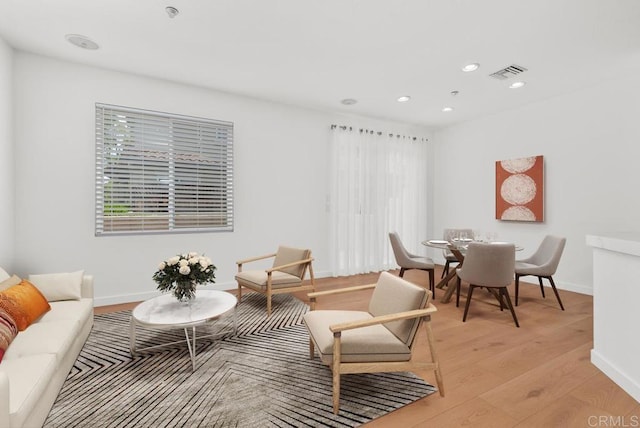 6180 Citracado Cir, Carlsbad, CA 92009 - living room featuring light wood-style floors and recessed lighting