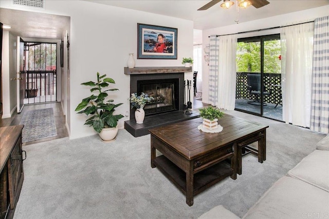 2157 Arnold Way Unit 821, Alpine, CA 91901 - carpeted living area featuring ceiling fan and a glass covered fireplace