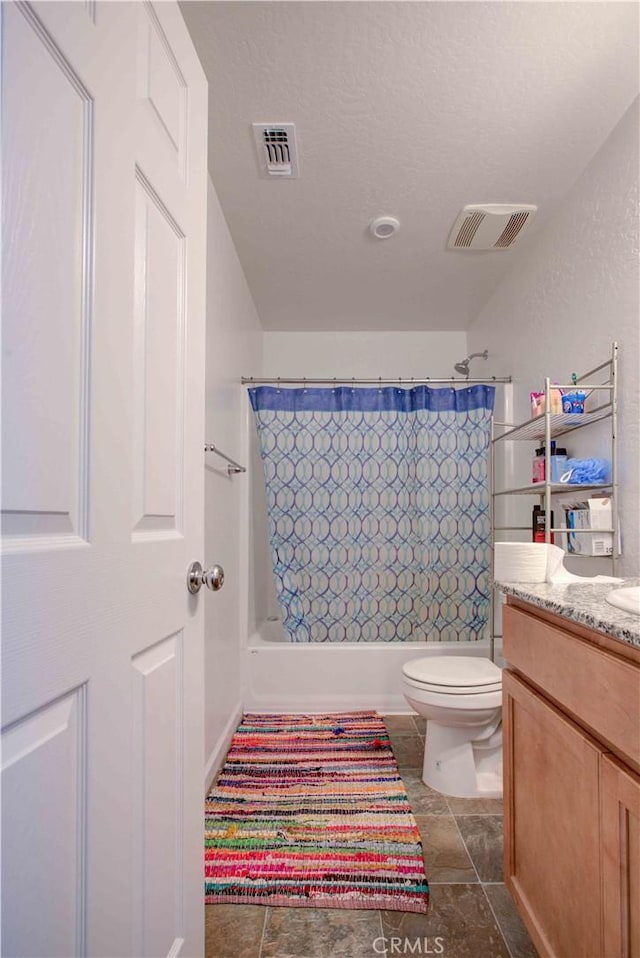2045 Conadria Ave, Chowchilla, CA 93610 - full bathroom featuring toilet, shower / tub combo with curtain, and vanity