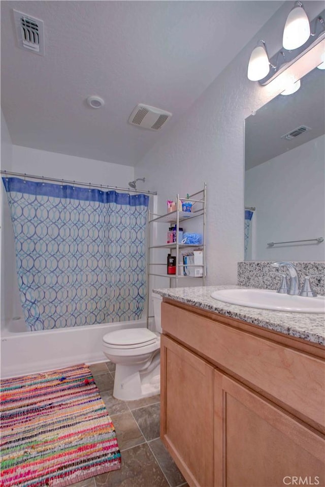 2045 Conadria Ave, Chowchilla, CA 93610 - bathroom with toilet, shower / bath combination with curtain, and vanity