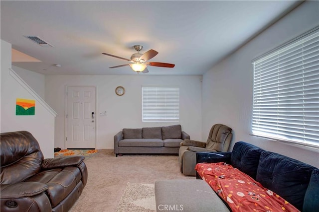 2045 Conadria Ave, Chowchilla, CA 93610 - carpeted living area featuring a ceiling fan and healthy amount of natural light