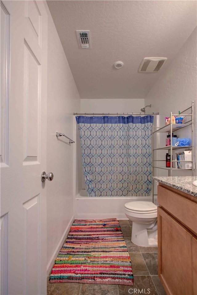 2045 Conadria Ave, Chowchilla, CA 93610 - full bathroom featuring toilet, shower / tub combo, vanity, and tile patterned floors