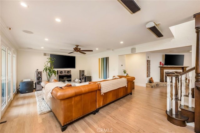 19151 Fowler Ave, North Tustin, CA 92705 - living room featuring a fireplace, crown molding, light wood-style flooring, recessed lighting, and a ceiling fan