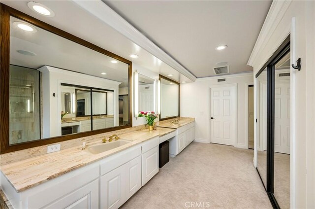 19151 Fowler Ave, North Tustin, CA 92705 - full bathroom featuring double vanity, a shower stall, recessed lighting, baseboards, and crown molding