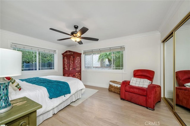 19151 Fowler Ave, North Tustin, CA 92705 - bedroom with a closet, multiple windows, wood finished floors, ornamental molding, and baseboards