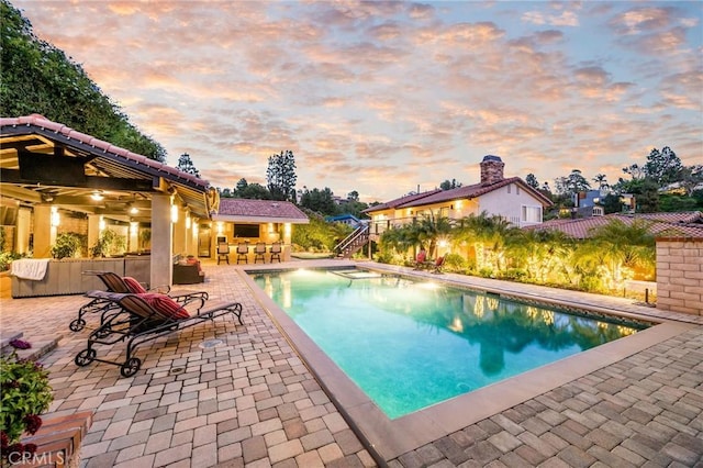19151 Fowler Ave, North Tustin, CA 92705 - pool at dusk with a patio area and an outdoor pool