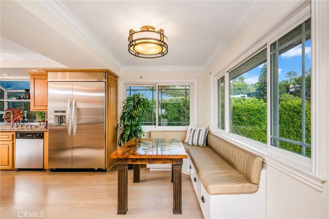 19151 Fowler Ave, North Tustin, CA 92705 - dining room with ornamental molding, light wood-style floors, and breakfast area